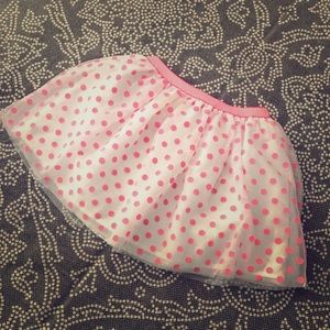 Pink and white polkadot skirt